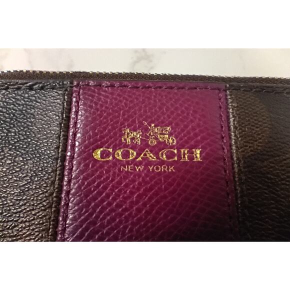 COACH Corner Zip Wristlet in Signature Canvas with Pink Accents - EUC - Picture 3 of 6